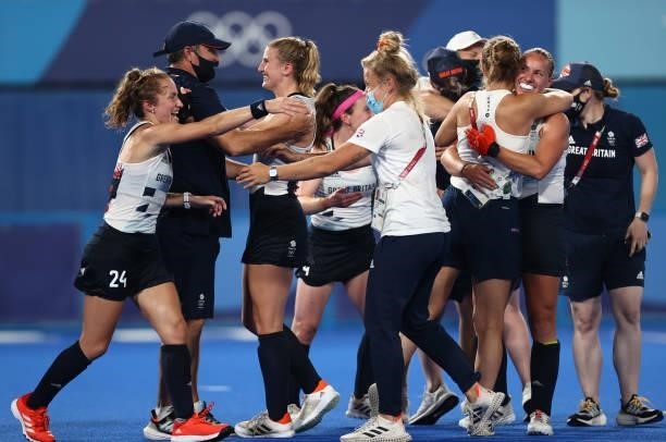 Team Great Britain celebrate victory in the Women's Quarterfinal match between Spain and Great Britain on day ten of the Tokyo 2020 Olympic Games at...