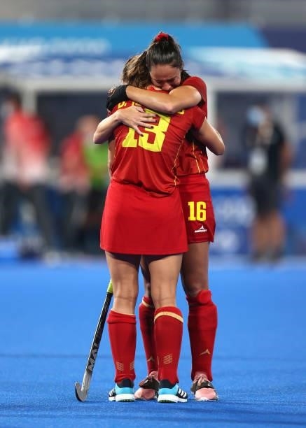 Belen Iglesias Marcos and Candela Mejias Zanetti of Team Spain embrace following a loss in the Women's Quarterfinal match between Spain and Great...