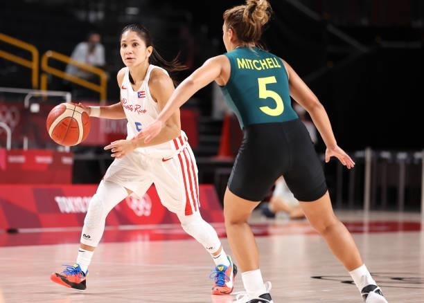 Pamela Rosado of Team Puerto Rico sets up the offense against Leilani Mitchell of Team Australia during the 2nd half of a Women's Basketball...