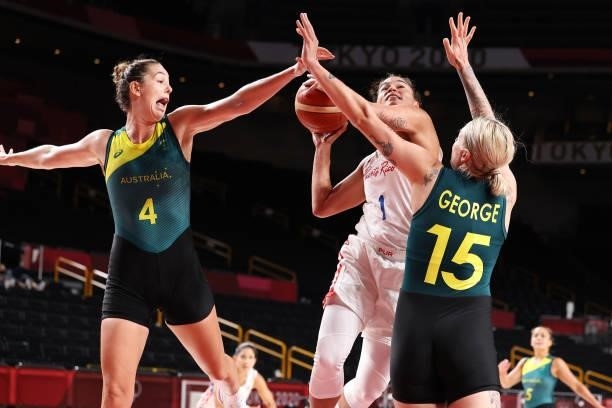 Tayra Melendez of Team Puerto Rico drives to the basket against Jenna O'Hea and Cayla George of Team Australia during the 2nd half of a Women's...