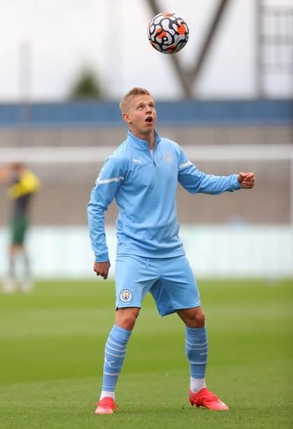 Oleksandr Zinchenko of Manchester City warms up prior to the pre-season friendly match between Manchester City and Barnsley at Manchester City...