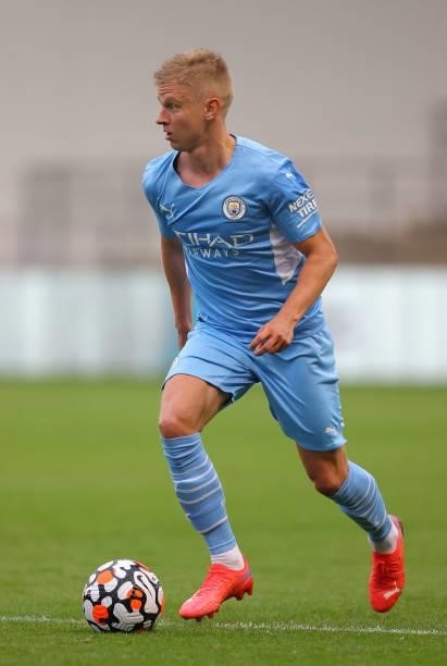 Oleksandr Zinchenko of Manchester City runs with the ball during the pre-season friendly match between Manchester City and Barnsley at Manchester...