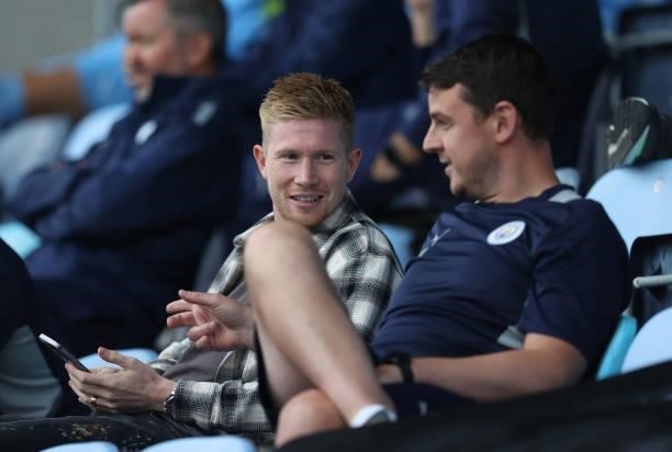 Kevin De Bruyne of Manchester City watches from the stands during the pre-season friendly match between Manchester City and Barnsley at Manchester...