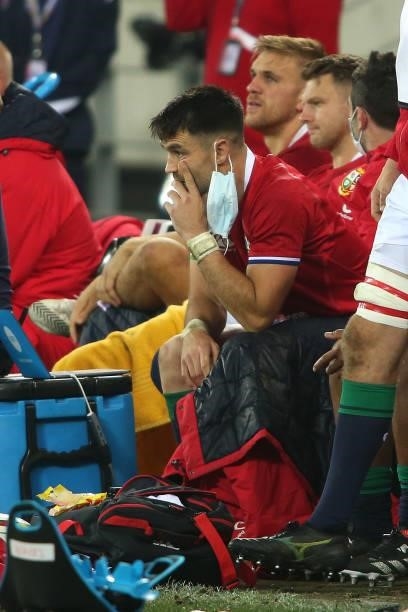 Worried Conor Murray of the British & Irish Lions watches from the bench during the second test between South Africa and the British & Irish Lions at...