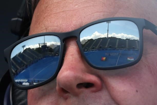 Detailed view of a reflection of the field is seen in a spectator's sunglasses prior to the Men's Semifinal match between India and Belgium on day...