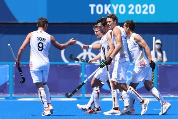 Loick Fanny A Luypaert of Team Belgium celebrates scoring the first goal with Victor Nicky B Wegnez and Nicolas de Kerpel during the Men's Semifinal...