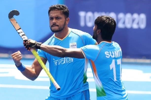 Harmanpreet Singh celebrates scoring the first goal with Sumit during the Men's Semifinal match between India and Belgium on day eleven of the Tokyo...