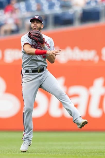 Luis Garcia of the Washington Nationals throws the ball to first base against the Philadelphia Phillies during Game One of the doubleheader at...