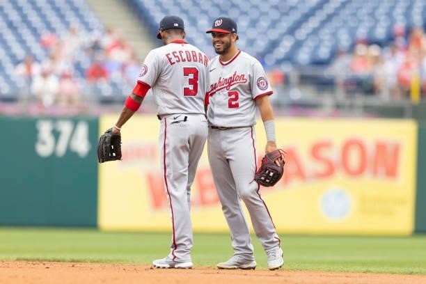 Luis Garcia and Alcides Escobar of the Washington Nationals react against the Philadelphia Phillies during Game One of the doubleheader at Citizens...