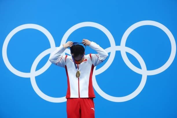 Gold medalist Xie Siyi of Team China poses during the medal ceremony for the Men's 3m Springboard Final on day eleven of the Tokyo 2020 Olympic Games...