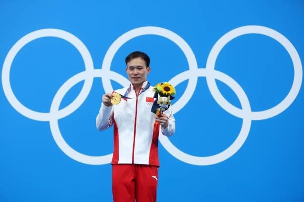 Gold medalist Xie Siyi of Team China poses during the medal ceremony for the Men's 3m Springboard Final on day eleven of the Tokyo 2020 Olympic Games...