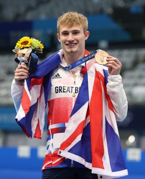 Jack Laugher of Great Britain poses with his bronze medal from his third place in the Men's 3m Springboard final on day eleven of the Tokyo 2020...
