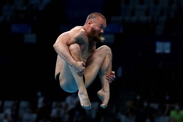 Evgeny Kuznetsov of Team ROC competes in the Men's 3m Springboard Final on day eleven of the Tokyo 2020 Olympic Games at Tokyo Aquatics Centre on...
