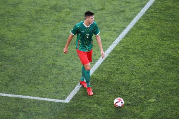 Cesar Montes of Team Mexico runs with the ball during the Men's Football Semi-final match between Mexico and Brazil on day eleven of the Tokyo 2020...