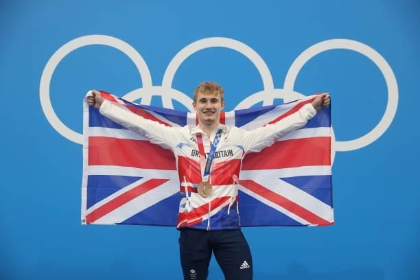 Jack Laugher of Great Britain poses with his bronze medal from his third place in the Men's 3m Springboard final on day eleven of the Tokyo 2020...