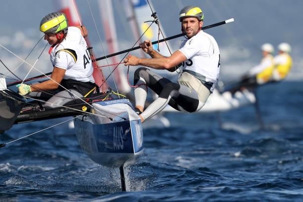 Jason Waterhouse and Lisa Darmanin of Team Australia compete in the Nacra 17 Foiling class on day eleven of the Tokyo 2020 Olympic Games at Enoshima...