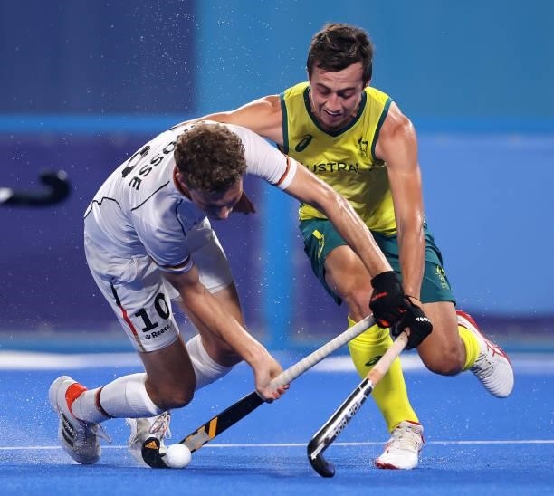 Lachlan Thomas Sharp of Team Australia pushes Johannes Grosse of Team Germany in the shooting circle, leading to a penalty corner awarded to Team...