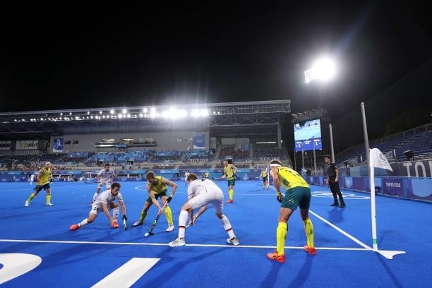 Benedikt Furk of Team Germany and Joshua Beltz of Team Australia battle for the ball during the Men's Semifinal match between Australia and Germany...