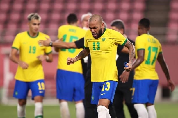 Dani Alves of Team Brazil celebrates following victory in the penalty shoot out after the Men's Football Semi-final match between Mexico and Brazil...