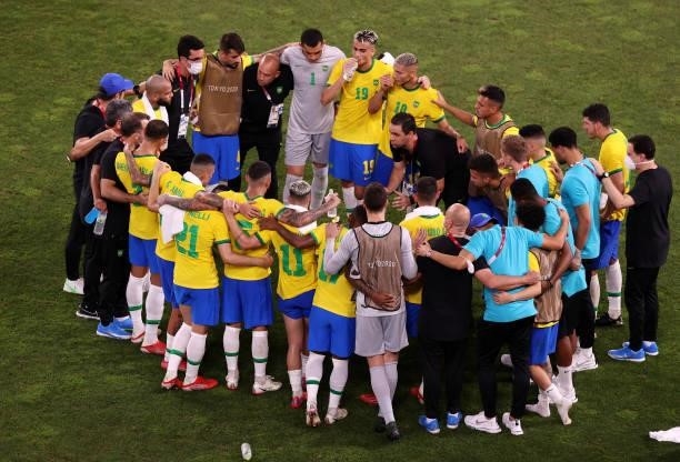 Andre Jardine, Head Coach of Brazil gives instructions to his players before the penalty shoot out during the Men's Football Semi-final match between...