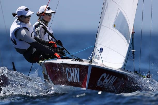Mengxi Wei and Haiyan Gao of Team China compete in the Women's 470 class on day eleven of the Tokyo 2020 Olympic Games at Enoshima Yacht Harbour on...