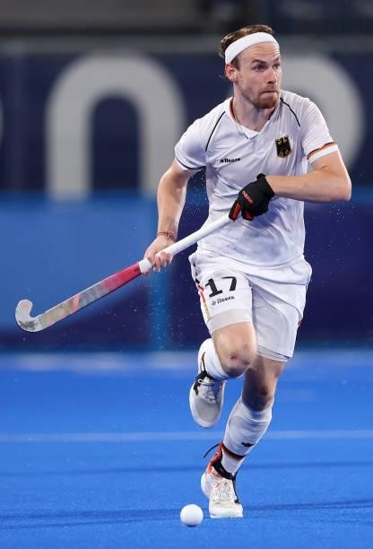 Jan Christopher Ruhr of Team Germany runs with the ball during the Men's Semifinal match between Australia and Germany on day eleven of the Tokyo...