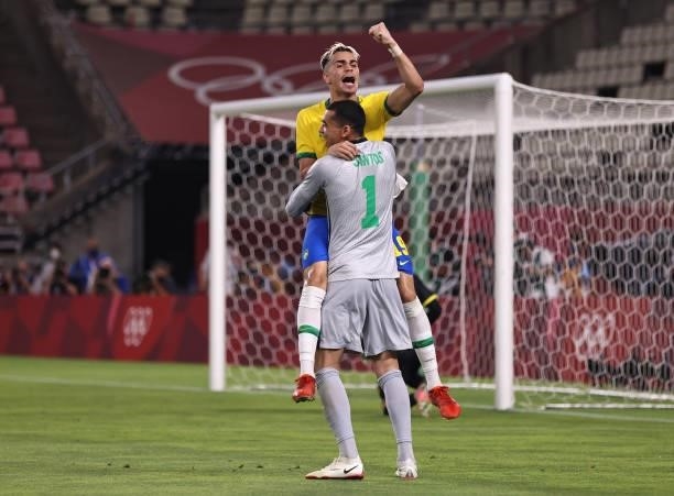 Reinier of Team Brazil celebrates with Santos after scoring their side's winning penalty during the penalty shoot out during the Men's Football...