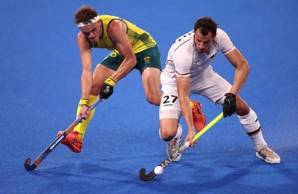 Tim Howard of Team Australia and Timur Oruz of Team Germany battle for the ball during the Men's Semifinal match between Australia and Germany on day...