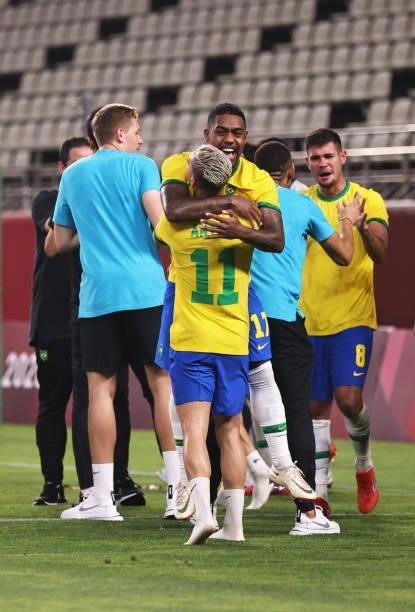 Antony of Team Brazil celebrates with Malcom following their side's victory in the Men's Football Semi-final match between Mexico and Brazil on day...