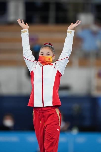 Gold medalist Guan Chenchen of Team China celebrates on the podium after the Women's Balance Beam Final on day eleven of the Tokyo 2020 Olympic Games...
