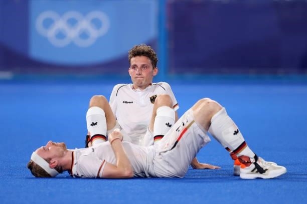 Johannes Grosse and Jan Christopher Ruhr of Team Germany react following a loss in the Men's Semifinal match between Australia and Germany on day...