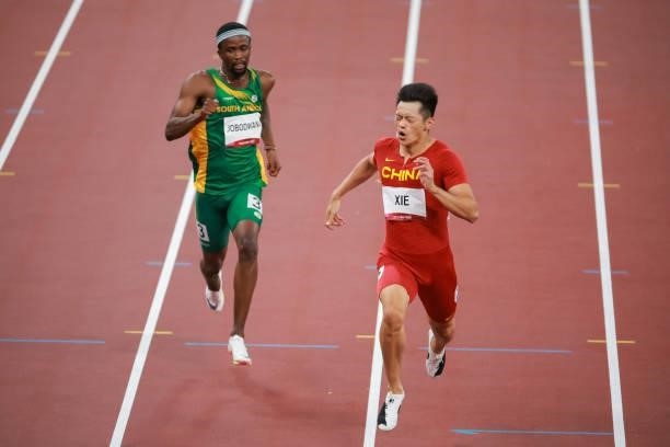 Anaso Jobodwana of Team South Africa and Zhenye Xie of Team China compete in the Men's 200m Semi-Final on day eleven of the Tokyo 2020 Olympic Games...