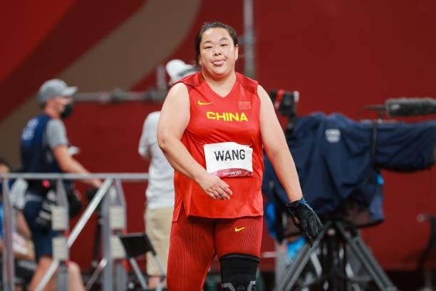Wang Zheng of Team China reacts in the Women's Hammer Throw Final on day eleven of the Tokyo 2020 Olympic Games at Olympic Stadium on August 3, 2021...