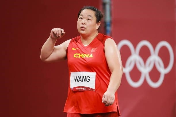 Wang Zheng of Team China reacts in the Women's Hammer Throw Final on day eleven of the Tokyo 2020 Olympic Games at Olympic Stadium on August 3, 2021...