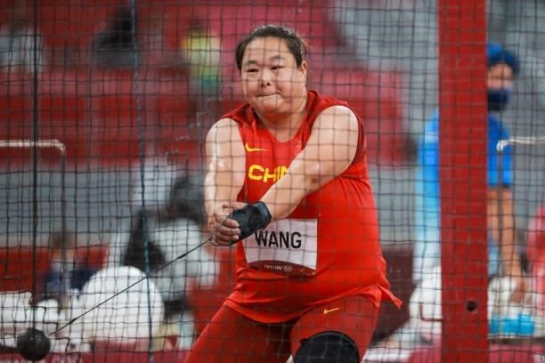 Wang Zheng of Team China competes in the Women's Hammer Throw Final on day eleven of the Tokyo 2020 Olympic Games at Olympic Stadium on August 3,...