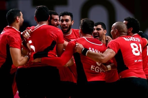 Team Egypt celebrate after winning the Men's Quarterfinal handball match between Germany and Egypt on day eleven of the Tokyo 2020 Olympic Games at...