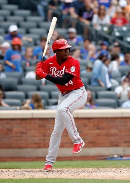 Aristides Aquino of the Cincinnati Reds in action against the New York Mets at Citi Field on August 01, 2021 in New York City. The Reds defeated the...