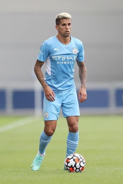 Joao Cancelo of Manchester City in possession during the Pre-Season Friendly match between Manchester City and Blackpool at Manchester City Football...