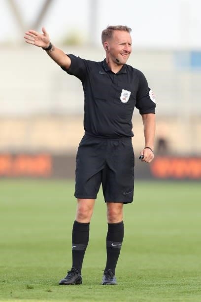 Match Referee, Oliver Langford gestures during the Pre-Season Friendly match between Manchester City and Blackpool at Manchester City Football...