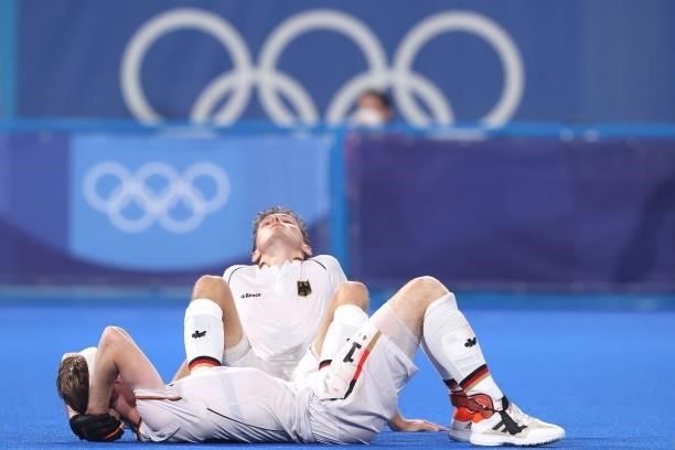Johannes Grosse and Jan Christopher Rühr of Team Germany react following a loss in the Men's Semifinal match between Australia and Germany on day...
