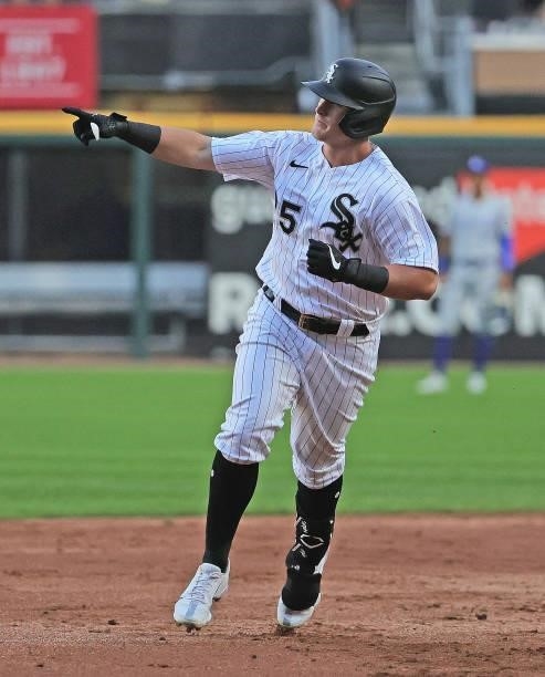 Andrew Vaughn of the Chicago White Sox points to the bullpen as he runs the bases after hitting a solo home run in the 2nd inning against the Kansas...