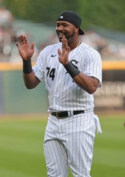 Eloy Jimenez of the Chicago White Sox waves to fans before a game against the Kansas City Royals at Guaranteed Rate Field on August 03, 2021 in...