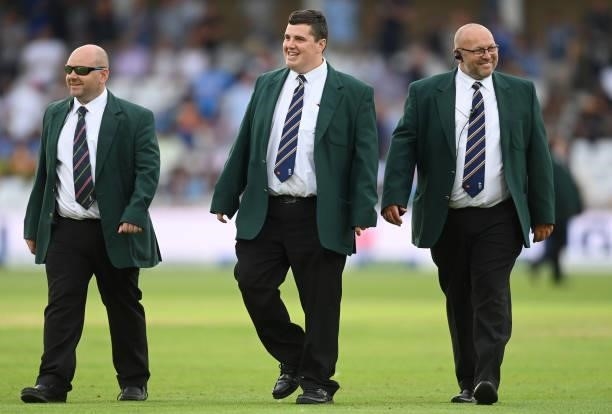 Three Trent Bridge stewards on the field during the 1st LV= Test match between England and India at Trent Bridge on August 04, 2021 in Nottingham,...