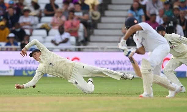 Zac Crawley of England stops a shot from Rohit Sharma of India during the 1st LV= Test match between England and India at Trent Bridge on August 04,...