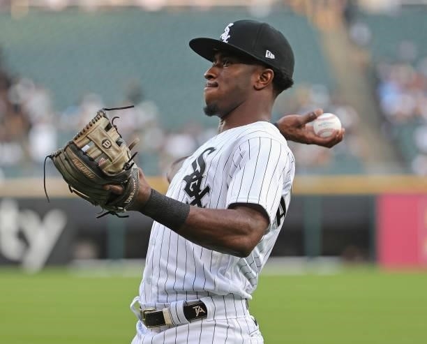 Tim Anderson of the Chicago White Sox throws a ball to fans before a game against the Kansas City Royals at Guaranteed Rate Field on August 03, 2021...