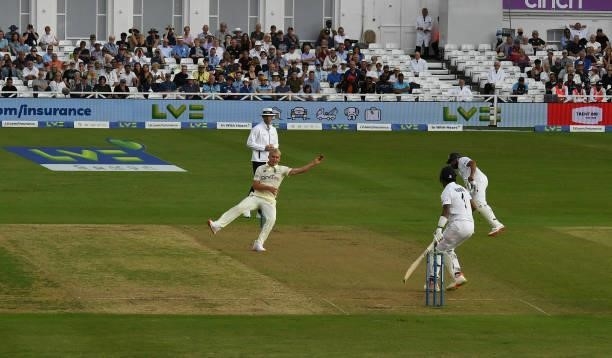 Sam Curran of England throws at the stumps during the 1st LV= Test match between England and India at Trent Bridge on August 04, 2021 in Nottingham,...
