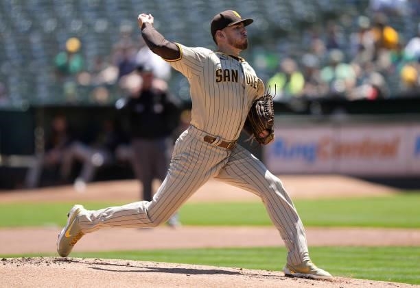 Joe Musgrove of the San Diego Padres pitches against the Oakland Athletics in the bottom of the first inning at RingCentral Coliseum on August 04,...