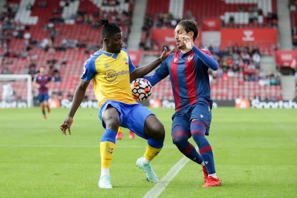 Mohammed Salisu of Southampton holds up Jose Campana of Levante during a pre-season friendly between Southampton FC and Levante UD at St Mary's...