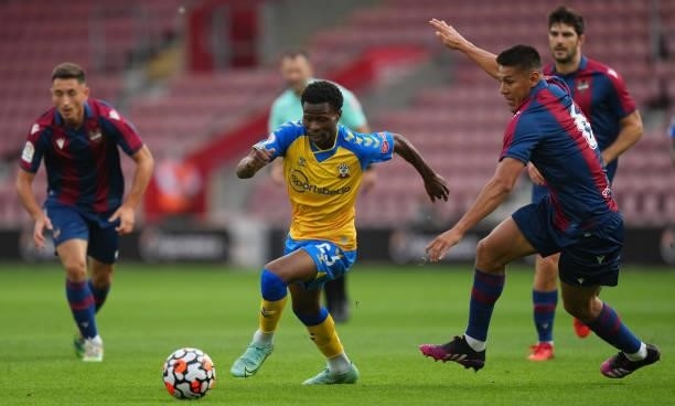 Nathan Tella of Southampton gets past Oscar Duarte of Levante during a pre season friendly between Southampton and Levante at St Mary's Stadium on...