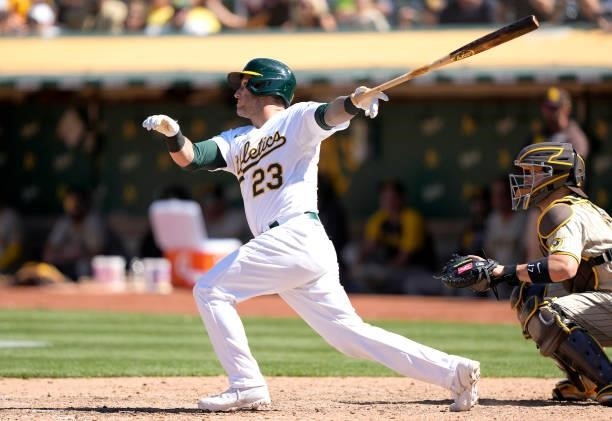 Yan Gomes of the Oakland Athletics gets a pinch-hit RBI single that scored Tony Kemp against the San Diego Padres in the bottom of the ninth inning...